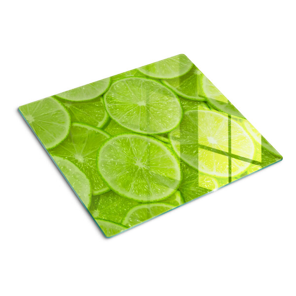 Tábua para cozinha Fatias de limão em um fundo verde