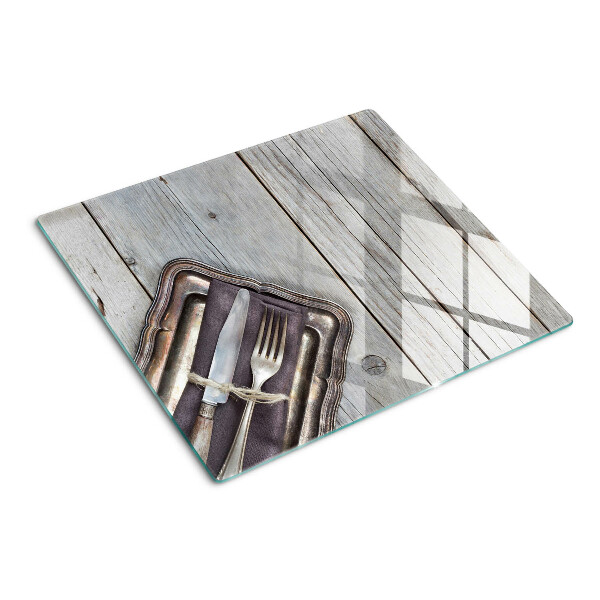 Tábua para corte Talheres rústicos sobre fundo de madeira