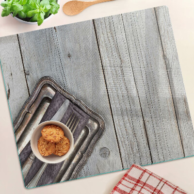 Tábua para corte Talheres rústicos sobre fundo de madeira