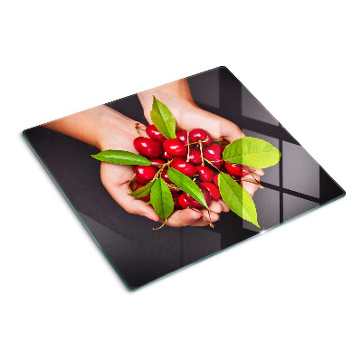 Tábua para cozinha Cerejas vermelhas nas mãos