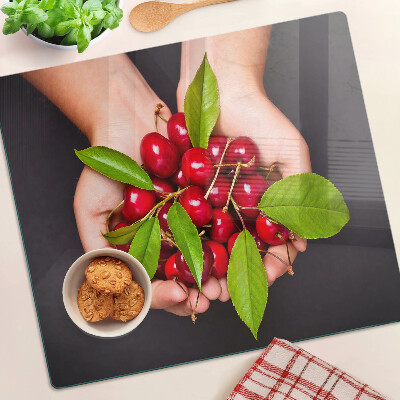 Tábua para cozinha Cerejas vermelhas nas mãos