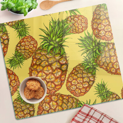 Tábua para corte Abacaxis em fundo amarelo
