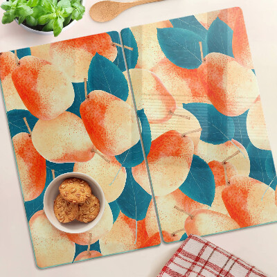 Tábua para cozinha Pêssegos contra o fundo de folhas