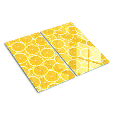 Tábua para corte Fatias de limão em um fundo amarelo