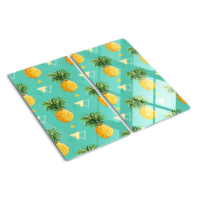 Tábua para corte Abacaxis em um fundo turquesa