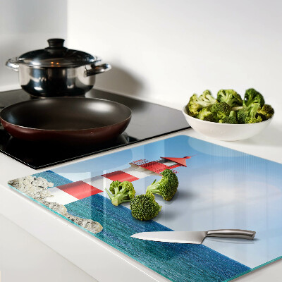 Tábua para cozinha Um farol sobre o oceano