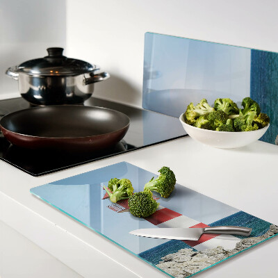 Tábua para cozinha Um farol sobre o oceano