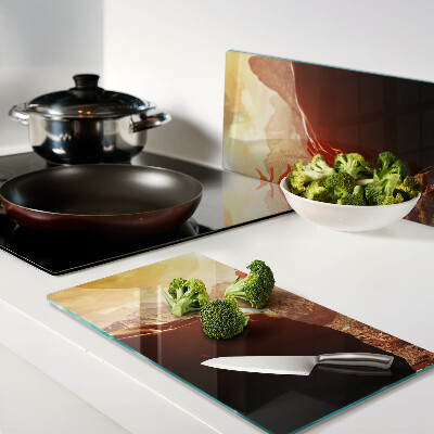 Tábua para corte Pular nas montanhas ao pôr do sol