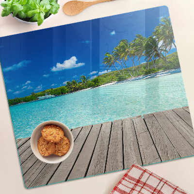 Tábua para corte Praia tropical com palmeiras