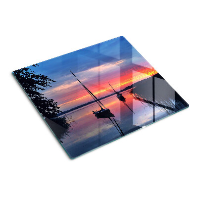Tábua para corte Pôr do sol sobre o lago