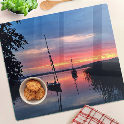 Tábua para corte Pôr do sol sobre o lago