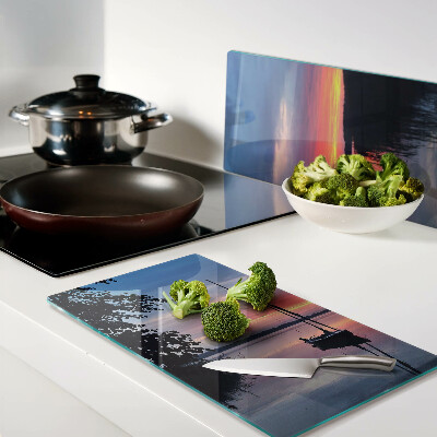 Tábua para corte Pôr do sol sobre o lago