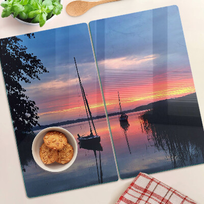 Tábua para corte Pôr do sol sobre o lago