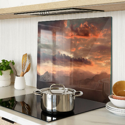 Tábua para corte Pôr do sol sobre as montanhas