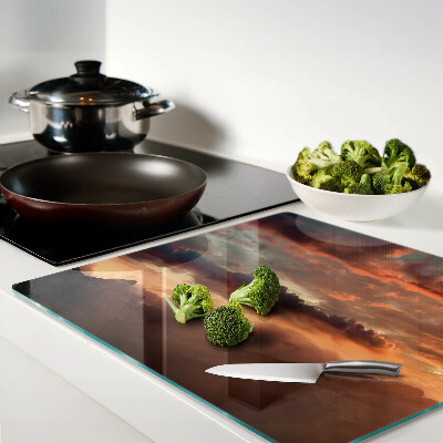 Tábua para corte Pôr do sol sobre as montanhas