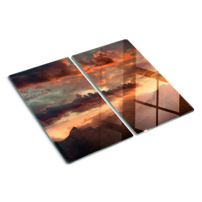 Tábua para corte Pôr do sol sobre as montanhas