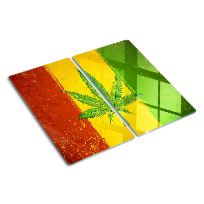 Tábua para cozinha Folha de cannabis em um fundo colorido