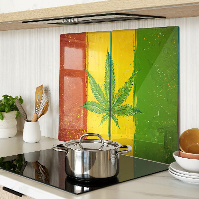 Tábua para cozinha Folha de cannabis em um fundo colorido