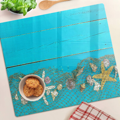 Tábua para cozinha Conchas e estrelas do mar em uma rede