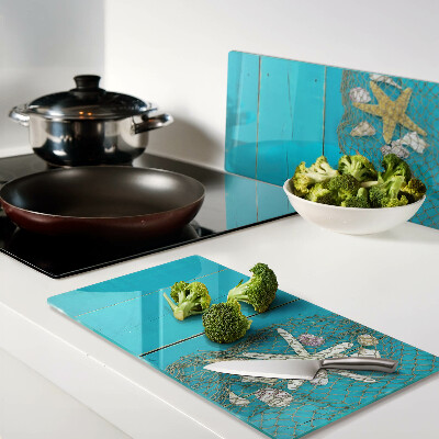 Tábua para cozinha Conchas e estrelas do mar em uma rede