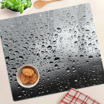 Tábua para corte Gotas de água no vidro