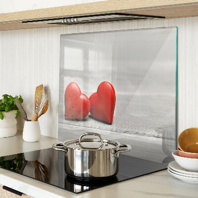 Tábua para cozinha Corações vermelhos em um fundo de madeira