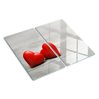 Tábua para cozinha Corações vermelhos em um fundo de madeira