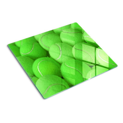 Tábua para cozinha Bolas de tênis em um fundo verde