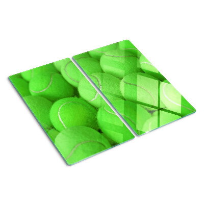Tábua para cozinha Bolas de tênis em um fundo verde
