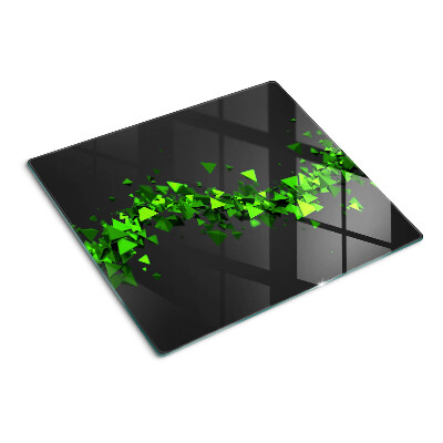 Tábua para corte Triângulos verdes em um fundo preto