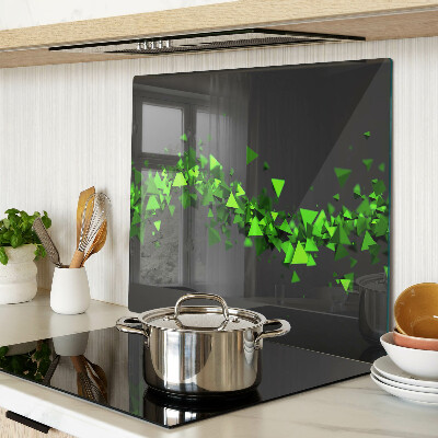 Tábua para corte Triângulos verdes em um fundo preto