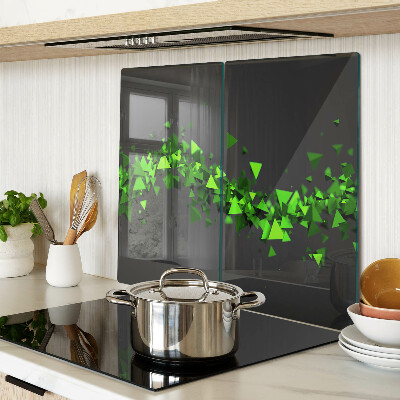 Tábua para corte Triângulos verdes em um fundo preto