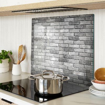 Tábua para corte Parede de tijolos em tons de cinza