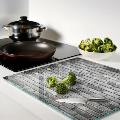 Tábua para corte Parede de tijolos em tons de cinza