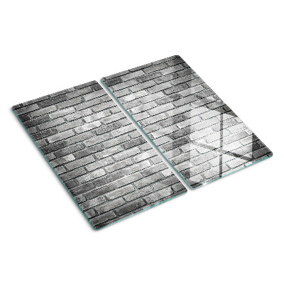 Tábua para corte Parede de tijolos em tons de cinza