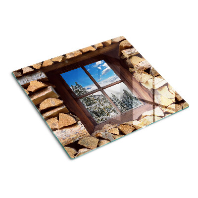 Tábua para corte Vista de uma paisagem de inverno através da janela