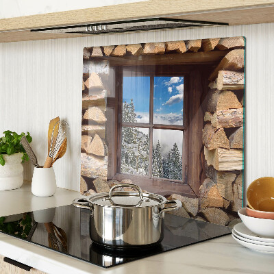 Tábua para corte Vista de uma paisagem de inverno através da janela