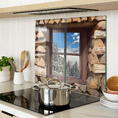 Tábua para corte Vista de uma paisagem de inverno através da janela