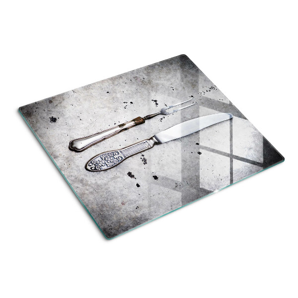 Tábua para corte Talheres em fundo de concreto