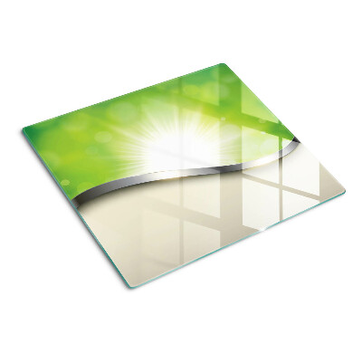 Tábua para corte Bokeh verde com raios de luz