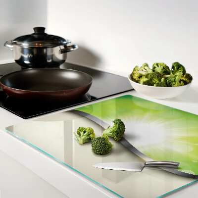 Tábua para corte Bokeh verde com raios de luz