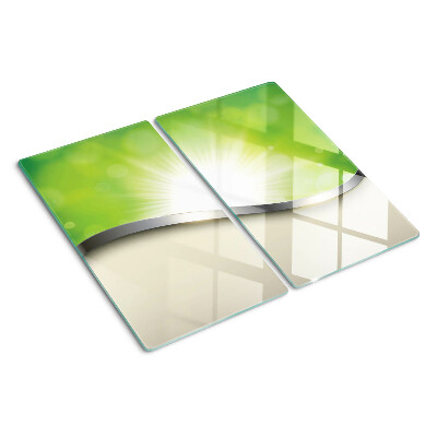 Tábua para corte Bokeh verde com raios de luz