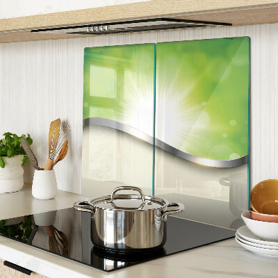 Tábua para corte Bokeh verde com raios de luz