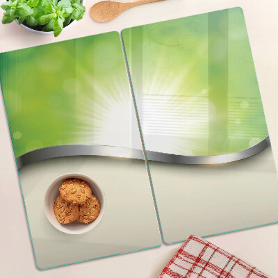 Tábua para corte Bokeh verde com raios de luz