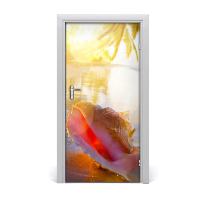 Papel de parede em porta Uma concha na praia