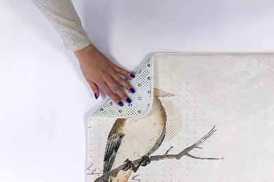 Tapete para banheira Um pássaro em um galho