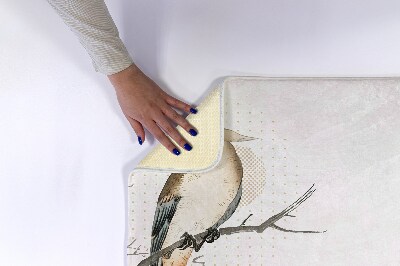 Tapete para banheira Um pássaro em um galho