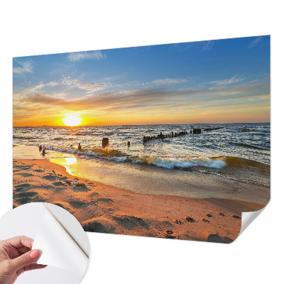 Autocolante de parede fotográfico com estampa de pôr do sol na praia