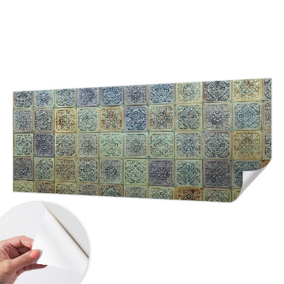 Papel de parede infantil com padrão de azulejos geométricos