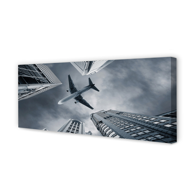 Quadro em tela Cidade nuvens avião céu
